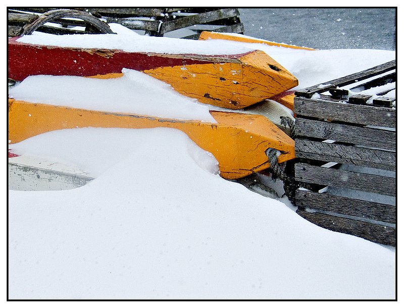 snow-and-buoys.jpg :: Mystic - A heavy snowstorm covers lobster buoys.