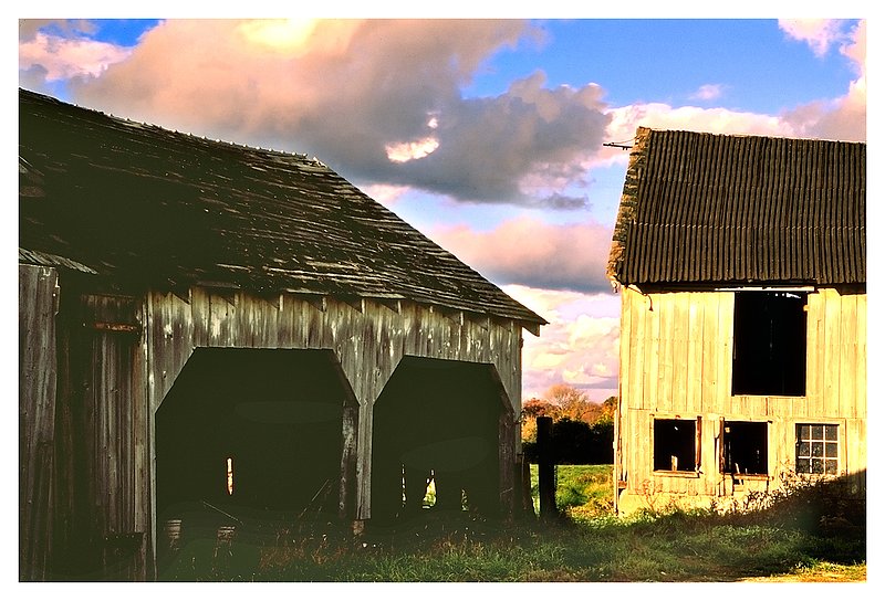 weathered barns.jpg :: Mystic - Thunder storms in the distance cast nice light on the rustic barns.