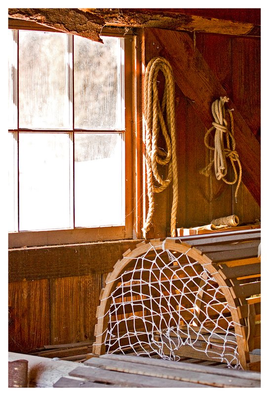 window-lobster-pot.jpg :: Mystic - Soft winter light shines through a window of a lobster shack.