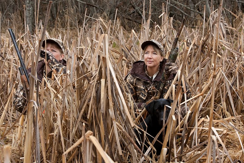 TC-Hunt-Women Waterfowl-D90081-00133.jpg :: Women Waterfowl Hunters in cattails, with black lab dog.