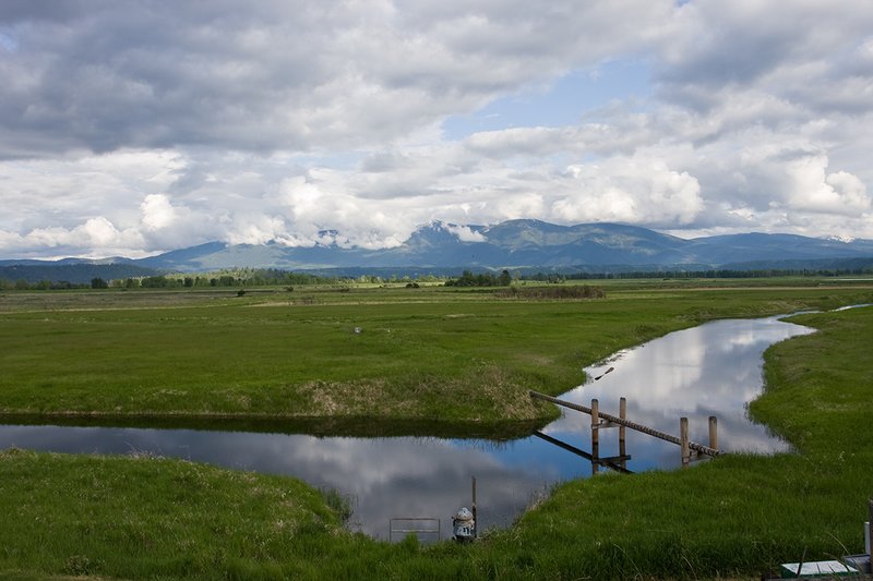 TC-Idaho Scenic-D50010-00024.jpg :: Water pump and pipeline crossing wetland used for irrigation on the Kooteani Wildlife Refuge in North Idaho near Bonners Ferry, Idaho