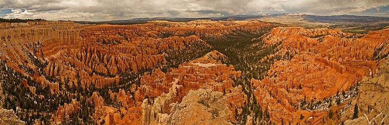 The Amphitheater at Bryce Canyon.jpg :: A 180-degree panorama captures an approaching storm and the sunset glow on the hoodoos at Bryce Canyon National Park, Utah. 
