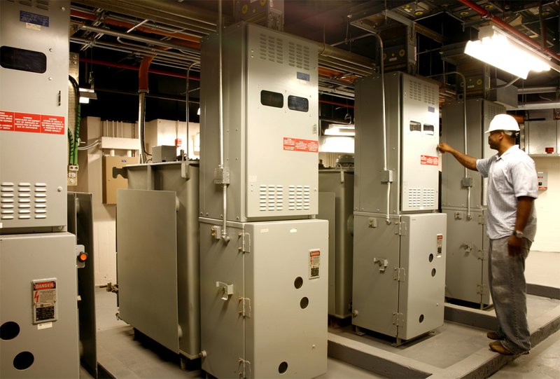 Grunley Construction - New IRS Bldg - Engineer at power boxes.jpg