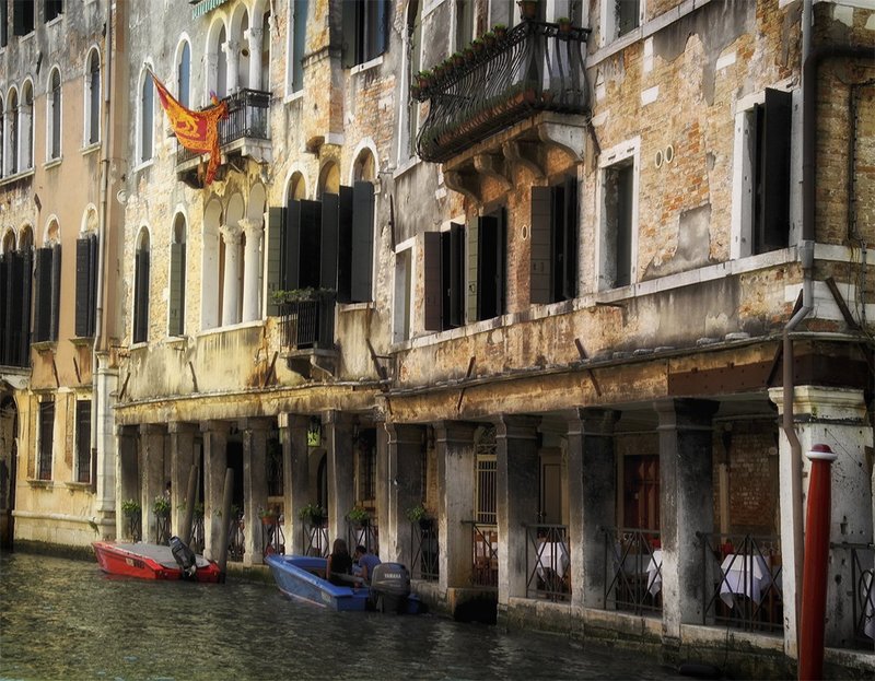 Venice restaurant on canal.jpg ::                                Restaurant on a Canal in Venice, Italy