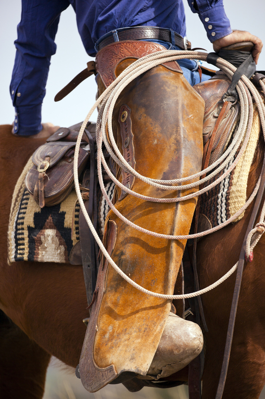 Chaps and Rope FINAL .jpg :: Clover Cliff Ranch in Elmdale, Kansas for their annual prairie burn fires.    Ranch is owned by Warren and Susie Harshman.
