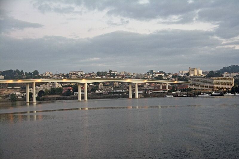 DC 22-0654-024.jpg :: Saga Douro River Cruise, Porto to Regua Lamego. The Freixo Bridge which was inaugurated in 1995 is a Portuguese bridge over the Douro river, connecting Vila Nova de Gaia and Porto. The purpose of its construction was to create an alternative to Arrábida and D. Luis I bridges. The designers of the bridge are António Reis and Daniel de Sousa. Photo taken 30/08/2022
