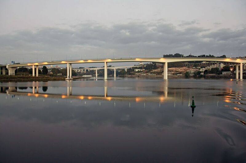 DC 22-0654-034.jpg :: Saga Douro River Cruise, Porto to Regua Lamego, The Freixo Bridge which was inaugurated in 1995 is a Portuguese bridge over the Douro river, connecting Vila Nova de Gaia and Porto. The purpose of its construction was to create an alternative to Arrábida and D. Luis I bridges. The designers of the bridge are António Reis and Daniel de Sousa. Photo taken 30/08/2022