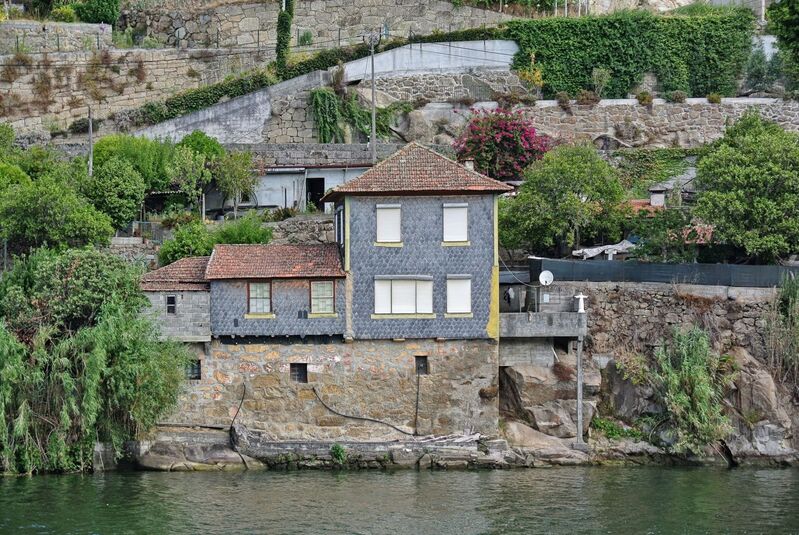 DC 22-0654-123.jpg :: Saga Douro River Cruise, Porto to Regua Lamego, River Douro: Early morning aboard the MS Douro Spirit departing Porto to Lamego. Embankment scenery on route to Lamego, passing Ribadouro. Photo taken 30/08/2022