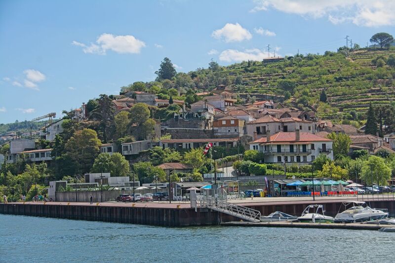 DC 22-0654-140.jpg :: Saga Douro River Cruise, Porto to Regua Lamego, River Douro: Early morning aboard the MS Douro Spirit departing Porto to Lamego. Embankment scenery on route to Lamego, passing marina at Miomães. Photo taken 30/08/2022