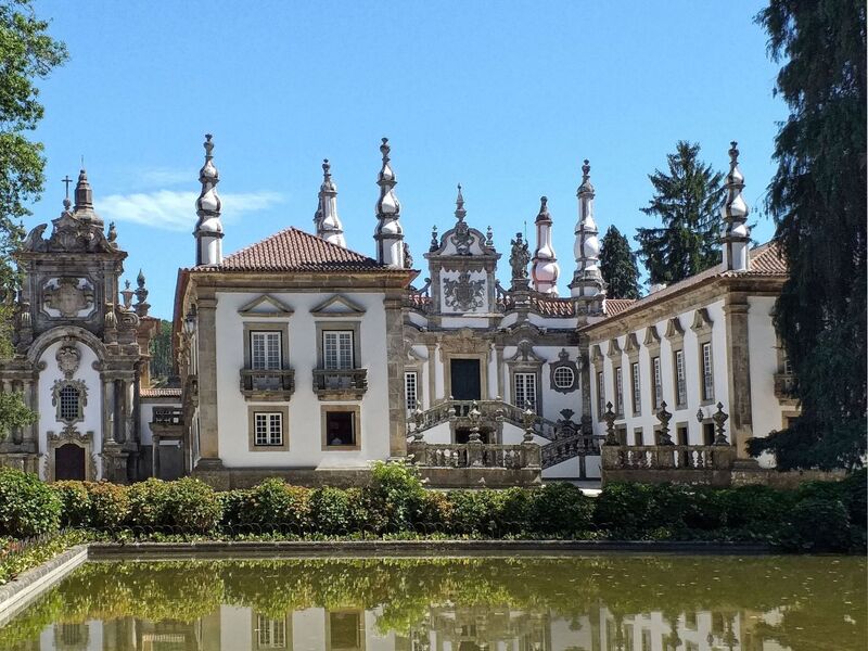 DC 22-0766-006.jpg :: Saga Douro River Cruise, Fundação da Casa de Mateus: The Mateus Palace , also known as the Solar de Mateus and Casa de Mateus , is located in the parish of Mateus , municipality of Vila Real, District of Vila Real. The Casa de Mateus was built in the first half of the 18th century by the 3rd Morgado de Mateus, António José Botelho Mourão. The house was always administered by the Sousa Botelho family. The project for this palace was presumably designed by the architect Nicolau Nasoni. The Palace consists of the main house, the gardens, the wine cellar and a chapel. The Mateus Palace has been classified as a National Monument since 1910. Photo taken 30/08/2022