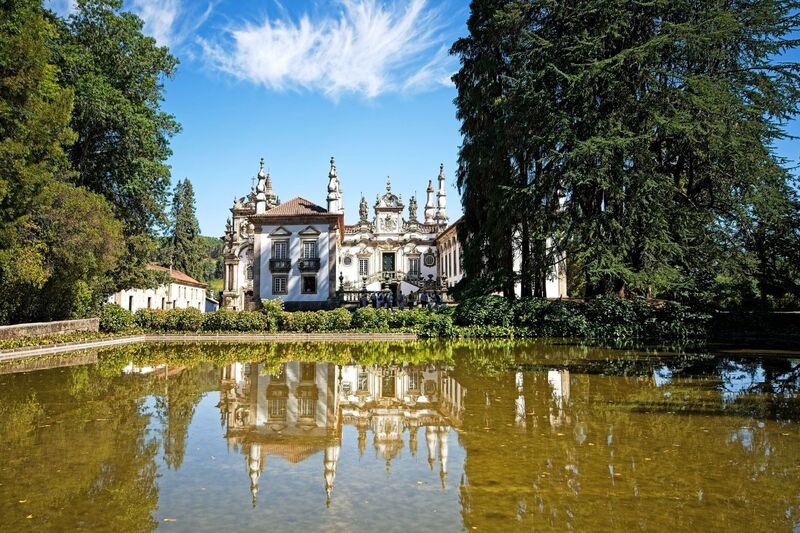 DC 22-0766-011.jpg :: Saga Douro River Cruise, Fundação da Casa de Mateus: The Mateus Palace , also known as the Solar de Mateus and Casa de Mateus , is located in the parish of Mateus , municipality of Vila Real, District of Vila Real. The Casa de Mateus was built in the first half of the 18th century by the 3rd Morgado de Mateus, António José Botelho Mourão. The house was always administered by the Sousa Botelho family. The project for this palace was presumably designed by the architect Nicolau Nasoni. The Palace consists of the main house, the gardens, the wine cellar and a chapel. The Mateus Palace has been classified as a National Monument since 1910. Photo taken 30/08/2022