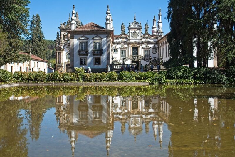 DC 22-0766-012.jpg :: Saga Douro River Cruise, Fundação da Casa de Mateus: The Mateus Palace , also known as the Solar de Mateus and Casa de Mateus , is located in the parish of Mateus , municipality of Vila Real, District of Vila Real. The Casa de Mateus was built in the first half of the 18th century by the 3rd Morgado de Mateus, António José Botelho Mourão. The house was always administered by the Sousa Botelho family. The project for this palace was presumably designed by the architect Nicolau Nasoni. The Palace consists of the main house, the gardens, the wine cellar and a chapel. The Mateus Palace has been classified as a National Monument since 1910. Photo taken 30/08/2022