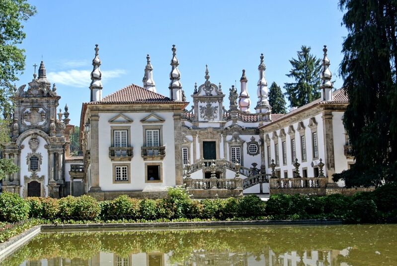 DC 22-0766-015.jpg :: Saga Douro River Cruise, Fundação da Casa de Mateus: The Mateus Palace , also known as the Solar de Mateus and Casa de Mateus , is located in the parish of Mateus , municipality of Vila Real, District of Vila Real. The Casa de Mateus was built in the first half of the 18th century by the 3rd Morgado de Mateus, António José Botelho Mourão. The house was always administered by the Sousa Botelho family. The project for this palace was presumably designed by the architect Nicolau Nasoni. The Palace consists of the main house, the gardens, the wine cellar and a chapel. The Mateus Palace has been classified as a National Monument since 1910. Photo taken 30/08/2022