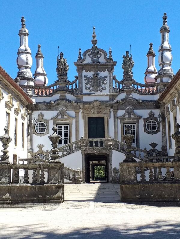 DC 22-0766-017.jpg :: Saga Douro River Cruise, Fundação da Casa de Mateus: The Mateus Palace , also known as the Solar de Mateus and Casa de Mateus , is located in the parish of Mateus , municipality of Vila Real, District of Vila Real. The Casa de Mateus was built in the first half of the 18th century by the 3rd Morgado de Mateus, António José Botelho Mourão. The house was always administered by the Sousa Botelho family. The project for this palace was presumably designed by the architect Nicolau Nasoni. The Palace consists of the main house, the gardens, the wine cellar and a chapel. The Mateus Palace has been classified as a National Monument since 1910. Photo taken 30/08/2022