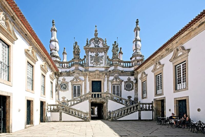 DC 22-0766-018.jpg :: Saga Douro River Cruise, Fundação da Casa de Mateus: The Mateus Palace, also known as the Solar de Mateus and Casa de Mateus, is located in the parish of Mateus, municipality of Vila Real, District of Vila Real. The Casa de Mateus was built in the first half of the 18th century by the 3rd Morgado de Mateus, António José Botelho Mourão. The house was always administered by the Sousa Botelho family. The project for this palace was presumably designed by the architect Nicolau Nasoni. The Palace consists of the main house, the gardens, the wine cellar and a chapel. The Mateus Palace has been classified as a National Monument since 1910. Photo taken 30/08/2022