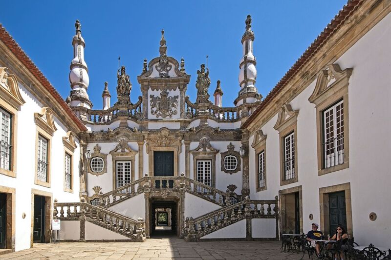 DC 22-0766-019.jpg :: Saga Douro River Cruise, Fundação da Casa de Mateus: The Mateus Palace, also known as the Solar de Mateus and Casa de Mateus, is located in the parish of Mateus, municipality of Vila Real, District of Vila Real. The Casa de Mateus was built in the first half of the 18th century by the 3rd Morgado de Mateus, António José Botelho Mourão. The house was always administered by the Sousa Botelho family. The project for this palace was presumably designed by the architect Nicolau Nasoni. The Palace consists of the main house, the gardens, the wine cellar and a chapel. The Mateus Palace has been classified as a National Monument since 1910. Photo taken 30/08/2022