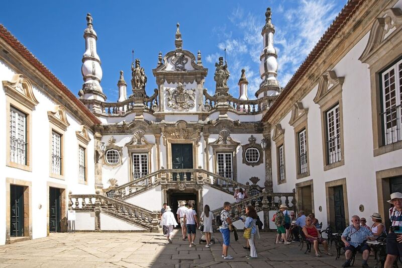 DC 22-0766-020.jpg :: Saga Douro River Cruise, Fundação da Casa de Mateus: The Mateus Palace, also known as the Solar de Mateus and Casa de Mateus, is located in the parish of Mateus, municipality of Vila Real, District of Vila Real. The Casa de Mateus was built in the first half of the 18th century by the 3rd Morgado de Mateus, António José Botelho Mourão. The house was always administered by the Sousa Botelho family. The project for this palace was presumably designed by the architect Nicolau Nasoni. The Palace consists of the main house, the gardens, the wine cellar and a chapel. The Mateus Palace has been classified as a National Monument since 1910. Photo taken 30/08/2022