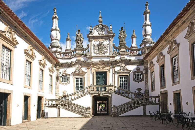 DC 22-0766-021.jpg :: Saga Douro River Cruise, Fundação da Casa de Mateus: The Mateus Palace, also known as the Solar de Mateus and Casa de Mateus, is located in the parish of Mateus, municipality of Vila Real, District of Vila Real. The Casa de Mateus was built in the first half of the 18th century by the 3rd Morgado de Mateus, António José Botelho Mourão. The house was always administered by the Sousa Botelho family. The project for this palace was presumably designed by the architect Nicolau Nasoni. The Palace consists of the main house, the gardens, the wine cellar and a chapel. The Mateus Palace has been classified as a National Monument since 1910. Photo taken 30/08/2022