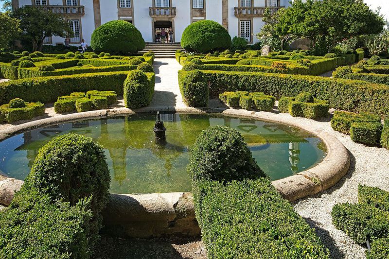 DC 22-0766-038.jpg :: Saga Douro River Cruise, Fundação da Casa de Mateus: The Mateus Palace, also known as the Solar de Mateus and Casa de Mateus, is located in the parish of Mateus, municipality of Vila Real, District of Vila Real. The leafy garden that surrounds the manor, in addition to its water mirror and boxwood areas. Photo taken 30/08/2022