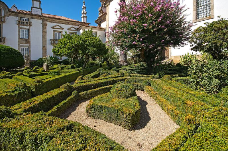 DC 22-0766-041.jpg :: Saga Douro River Cruise, Fundação da Casa de Mateus: The Mateus Palace, also known as the Solar de Mateus and Casa de Mateus, is located in the parish of Mateus, municipality of Vila Real, District of Vila Real. The leafy garden that surrounds the manor, in addition to its water mirror and boxwood areas. Photo taken 30/08/2022