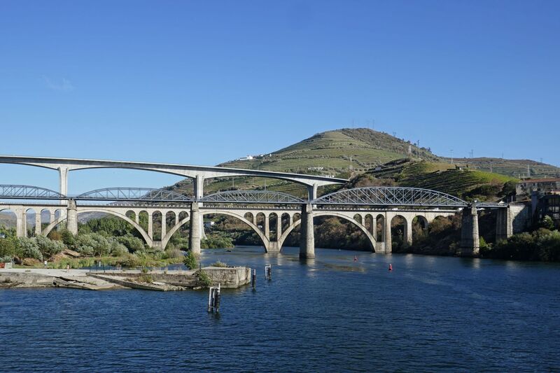 DC 22-0789-015.jpg :: Saga Douro River Cruise, Regua Lamego to Pinhao, River Douro: The Régua Railway Bridge at Peso da Régua, also known as the Régua Road Bridge and Ponte Miguel Torga at Peso da Régua. Photo taken 30/08/2022.