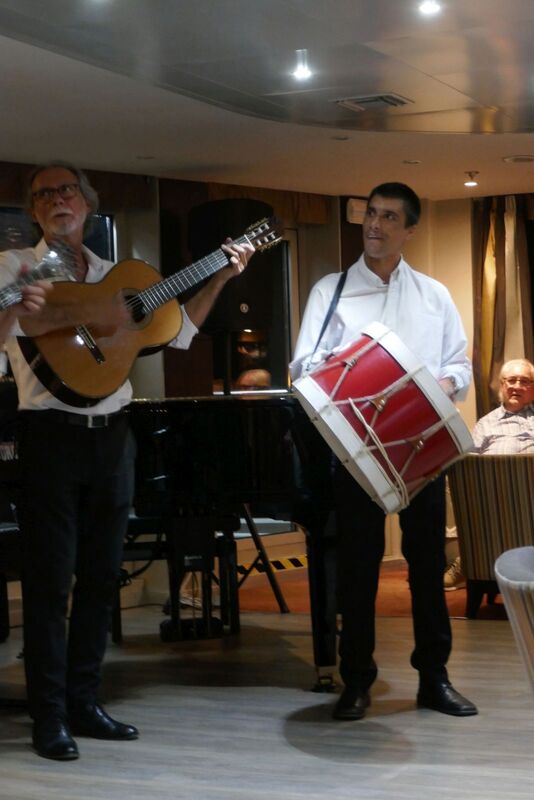 DC 22-0789-036.jpg :: Saga Douro River Cruise, Regua Lamego to Pinhao, River Douro: Fado musicians, known as fadistas, are performers of Fado, a traditional Portuguese music genre characterized by deep emotions and longing, or saudade. Photo taken 30/08/2022.