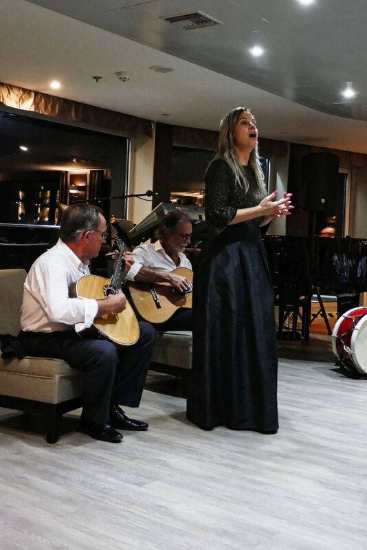 DC 22-0789-045.jpg :: Saga Douro River Cruise, Regua Lamego to Pinhao, River Douro: Fado musicians, known as fadistas, are performers of Fado, a traditional Portuguese music genre characterized by deep emotions and longing, or saudade. Photo taken 30/08/2022.