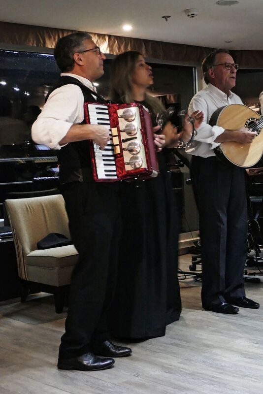 DC 22-0789-050.jpg :: Saga Douro River Cruise, Regua Lamego to Pinhao, River Douro: Fado musicians, known as fadistas, are performers of Fado, a traditional Portuguese music genre characterized by deep emotions and longing, or saudade. Photo taken 30/08/2022.