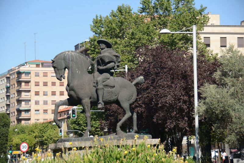 DC 22-0794-019.jpg :: Saga Douro River Cruise, Salamanca. Spain: This is the Monument to the Cowboy Charro (Monumento al Charro), a bronze sculpture in Salamanca, the sculpture is located in Plaza de España (Spain Square). It was created by the Spanish sculptor Venancio Blanco, who made several monumental bronzes of \