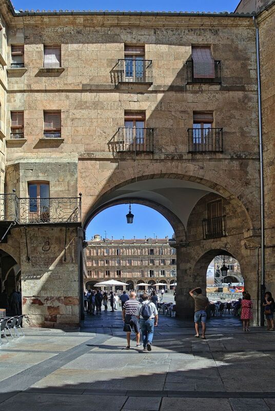 DC 22-0794-041.jpg :: Saga Douro River Cruise, Salamanca. Spain: The image shows an archway leading into the Plaza Mayor in Salamanca. The archway is known as the \