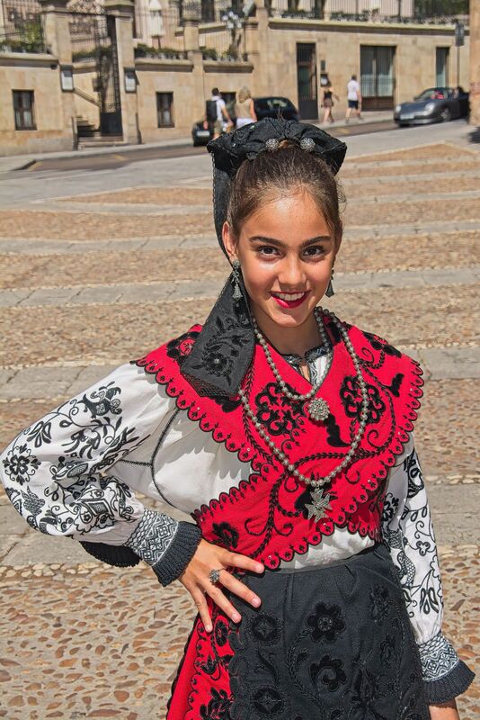 DC 22-0794-055.jpg :: Saga Douro River Cruise, Salamanca. Spain: Young Spanish girl in traditional Spanish costume at the Plaza del Concilio de Trento. Photo taken 01/09/2022