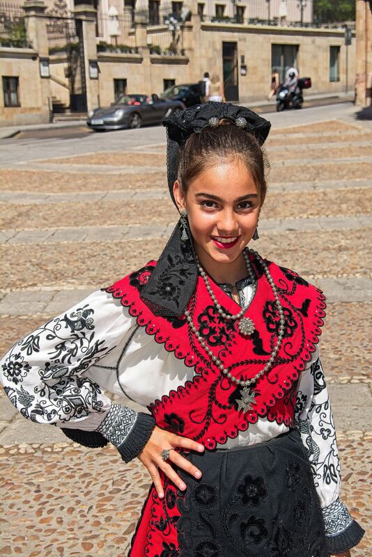 DC 22-0794-056.jpg :: Saga Douro River Cruise, Salamanca. Spain: Young Spanish girl in traditional Spanish costume at the Plaza del Concilio de Trento. Photo taken 01/09/2022