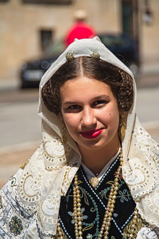 DC 22-0794-058.jpg :: Saga Douro River Cruise, Salamanca. Spain: Young Senorita in traditional Spanish costume at the Plaza del Concilio de Trento. Photo taken 01/09/2022