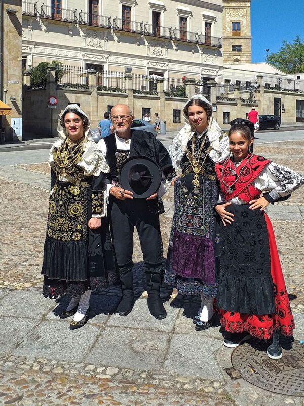 DC 22-0794-065.jpg :: Saga Douro River Cruise, Salamanca. Spain: Spanish family in traditional Spanish costume at the Plaza del Concilio de Trento. Photo taken 01/09/2022