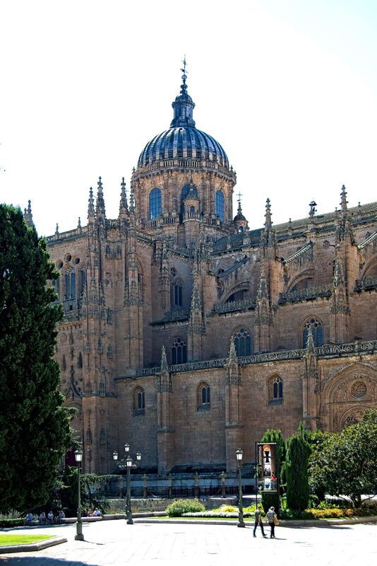DC 22-0794-071.jpg :: Saga Douro River Cruise, Salamanca. Spain: The New Cathedral of Salamanca (Catedral Nueva), located in Salamanca, Spain. This architectural marvel is a blend of late Gothic, Plateresque, and Baroque styles. Construction took place between 1513 and 1733, making it one of the largest cathedrals in Spain. It is part of a unique complex where the New Cathedral is built alongside the older Romanesque-style Old Cathedral (Catedral Vieja). The cathedral is known for its impressive height, including a tower that stands at 92 meters, one of the tallest in Spain. A notable curiosity is the modern carving of an astronaut on one of the cathedral's doors, added during a 20th-century restoration. Photo taken 01/09/2022