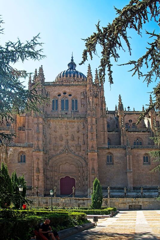 DC 22-0794-074.jpg :: Saga Douro River Cruise, Salamanca. Spain: The New Cathedral of Salamanca (Catedral Nueva), located in Salamanca, Spain. This architectural marvel is a blend of late Gothic, Plateresque, and Baroque styles. Construction took place between 1513 and 1733, making it one of the largest cathedrals in Spain. It is part of a unique complex where the New Cathedral is built alongside the older Romanesque-style Old Cathedral (Catedral Vieja). The cathedral is known for its impressive height, including a tower that stands at 92 meters, one of the tallest in Spain. A notable curiosity is the modern carving of an astronaut on one of the cathedral's doors, added during a 20th-century restoration. Photo taken 01/09/2022