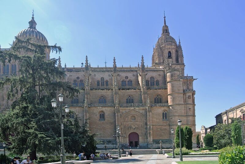 DC 22-0794-080.jpg :: Saga Douro River Cruise, Salamanca. Spain: The New Cathedral of Salamanca (Catedral Nueva), located in Salamanca, Spain. This architectural marvel is a blend of late Gothic, Plateresque, and Baroque styles. Construction took place between 1513 and 1733, making it one of the largest cathedrals in Spain. It is part of a unique complex where the New Cathedral is built alongside the older Romanesque-style Old Cathedral (Catedral Vieja). The cathedral is known for its impressive height, including a tower that stands at 92 meters, one of the tallest in Spain. A notable curiosity is the modern carving of an astronaut on one of the cathedral's doors, added during a 20th-century restoration. Photo taken 01/09/2022
