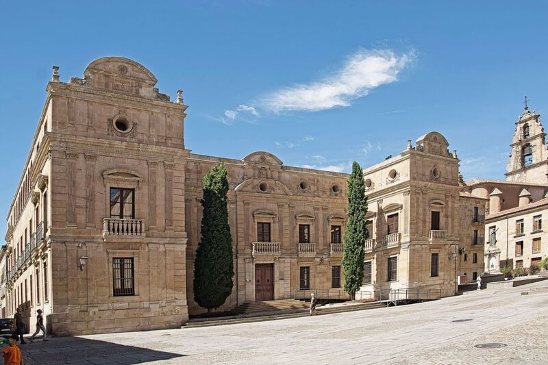 DC 22-0794-089.jpg :: Saga Douro River Cruise, Salamanca. Spain: The Palacio Episcopal de Salamanca (Episcopal Palace of Salamanca), which currently houses the Salamanca Museum of History and the Diocesan Museum of Sacred Art. It is located in Plaza Juan XXIII, near the city's cathedrals. The current structure was largely built between 1886 and 1889 in a classicist style by architect José Secall y Asión, on the site of an earlier medieval palace. The building incorporates elements from earlier periods and is part of the historic centre of Salamanca, a UNESCO World Heritage site. Historically, it served as the residence for the Bishops of Salamanca. Notably, during the Spanish Civil War, it was used as General Franco's residency and headquarters. Today, it is open to the public as a museum complex. Visitors can explore a collection of historic and contemporary artworks, including paintings by artists like Fernando Gallego, as well as church artifacts and antiquities. Photo taken 01/09/2022