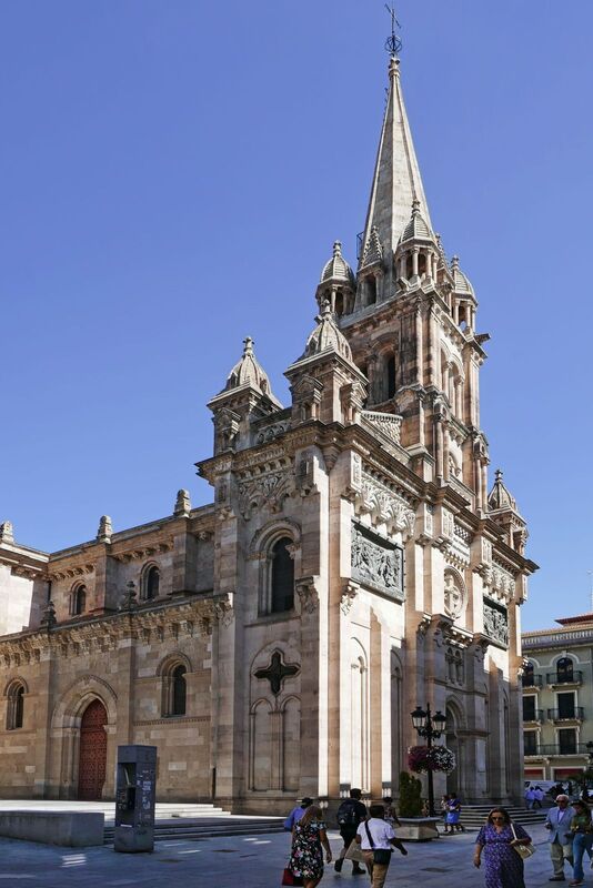 DC 22-0794-094.jpg :: Saga Douro River Cruise, Salamanca. Spain: The Church of Saint John of Sahagún (Iglesia de San Juan de Sahagún), located in Salamanca. The church is situated on Toro Street, a short walk from the Plaza Mayor. It is built in a Neo-Romanesque style. The church was constructed in the late 19th century, with work beginning in 1896, and dedicated to the city's patron saint, Saint John of Sahagún. The facade is notable for its detailed carvings that depict various miracles attributed to San Juan de Sahagún. Photo taken 01/09/2022