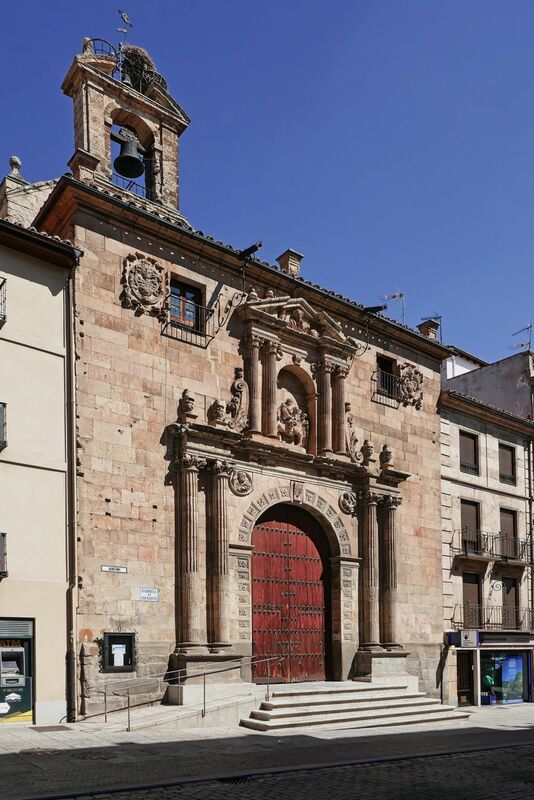 DC 22-0794-161.jpg :: Saga Douro River Cruise, Salamanca. Spain: Iglesia de San Martín de Tours (Church of Saint Martin of Tours). This historic church, also referred to as San Martín Church, is a prominent landmark located near the Plaza Mayor. It is an example of Spanish Romanesque architecture. It was declared a National Historic-Artistic Monument (a Spanish asset of cultural interest) in 1931. The church was built in the 12th century, on top of a previous construction, during the city's resettlement. Photo taken 01/09/2022