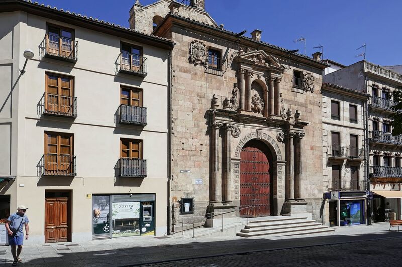 DC 22-0794-162.jpg :: Saga Douro River Cruise, Salamanca. Spain: Iglesia de San Martín de Tours (Church of Saint Martin of Tours). This historic church, also referred to as San Martín Church, is a prominent landmark located near the Plaza Mayor. It is an example of Spanish Romanesque architecture. It was declared a National Historic-Artistic Monument (a Spanish asset of cultural interest) in 1931. The church was built in the 12th century, on top of a previous construction, during the city's resettlement. Photo taken 01/09/2022