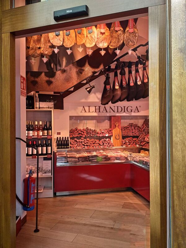 DC 22-0794-189.jpg :: Saga Douro River Cruise, Salamanca. Spain: Alhándiga, Iberian ham store outlet in Plaza del Corrillo. Photo taken 01/09/2022