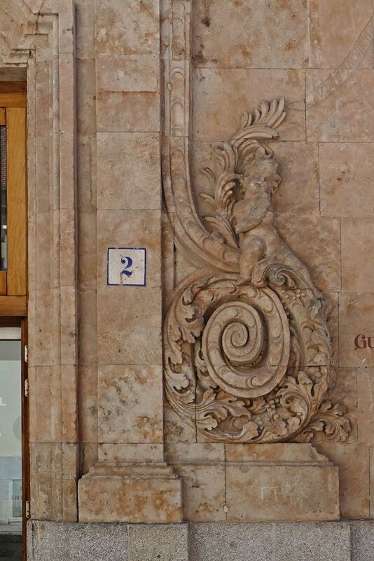 DC 22-0794-196.jpg :: Saga Douro River Cruise, Salamanca. Spain: The Centro Documental de la Memoria Histórica (Documentary Centre of Historical Memory), also known as the General Archive of the Spanish Civil War. This museum and archive is dedicated to the history of the Spanish Civil War, the Francoist dictatorship, and Freemasonry. It is situated in the historic city of Salamanca, specifically at Calle de el Expolio, 2 (or Calle Gibraltar, 2). The centre holds extensive archives including over 2000 posters from the Civil War, documents, photographs, and artifacts, with free admission. A notable permanent exhibit is a recreation of a Masonic lodge using confiscated objects. The posters visible on the building advertise an exhibition related to Francisco Largo Caballero, a prominent Spanish socialist leader during the Second Republic and the Civil War. Photo taken 01/09/2022