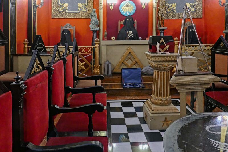 DC 22-0794-197.jpg :: Saga Douro River Cruise, Salamanca. Spain: A recreation of a Masonic Lodge at the General Archive of the Spanish Civil War in Salamanca, Spain. The exhibit provides insight into Freemasonry, which is one of the world's oldest social and charitable organizations. The archive in Salamanca is a historical museum containing extensive material related to the Spanish Civil War. Freemasonry evolved from the guilds of medieval stonemasons who built cathedrals and castles. The organization emphasizes morality, charity, and obedience to the law, while subscribing to no particular religious orthodoxy. The text \