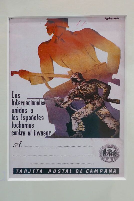 DC 22-0794-215.jpg :: Saga Douro River Cruise, Salamanca. Spain: General Archive of the Spanish Civil War in Salamanca. A Spanish Civil War propaganda postcard from the Republican side, created to recruit members for the International Brigades. The artwork is attributed to the artist Parrilla. Propaganda Postcard (Tarjeta Postal de Campaña). The poster's text is in Spanish and translates to: \