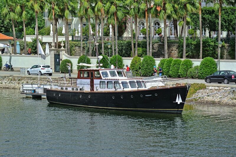 DC 22-0797-084.jpg :: Saga Douro River Cruise, Pocinho to Pinhao, River Douro: The vintage wooden yacht Friendship I and the Vintage House Douro hotel in Pinhão, Portugal. The vessel is a 66-foot classic \