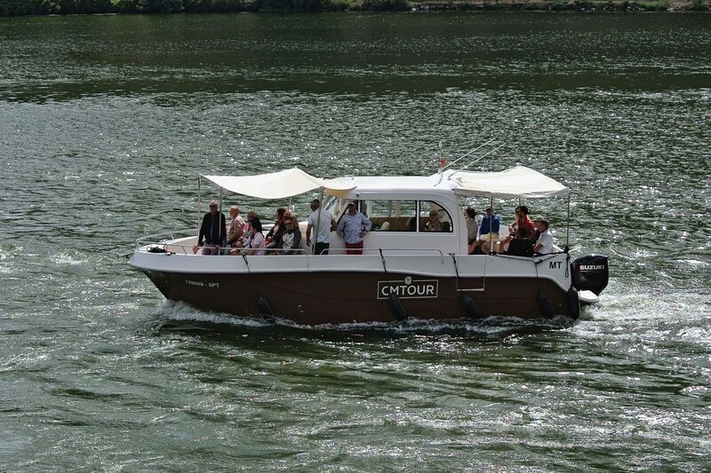 DC 22-0797-096.jpg :: Saga Douro River Cruise, Pocinho to Pinhao, River Douro: The smaller vessel in the foreground is a tour boat operated by CMTOUR. The tour boat offers shorter, regional trips and experiences operating out of Pinhao. Photo taken 02/09/2022