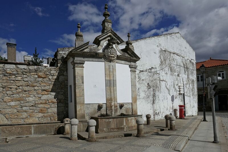 DC 22-0808-003.jpg :: Saga Douro River Cruise, Favaios: The fountain in the image is the Fonte Manuelina (Manueline Fountain) in the historic village of Favaios, Portugal. This beautiful fountain is one of the most important monuments in the town centre of Favaios, which is known as a \