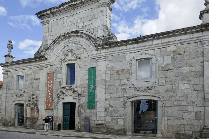 DC 22-0808-013.jpg :: Saga Douro River Cruise, Favaios:  The building in the image is the Núcleo Museológico de Favaios - Pão e Vinho, also known as the Bread and Wine Museum. The museum is located on Rua Direita in the charming village of Favaios, within the Douro Valley region of Northern Portugal. It is housed in an 18th-century building, locally referred to as \