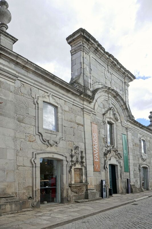 DC 22-0808-014.jpg :: Saga Douro River Cruise, Favaios:  The building in the image is the Núcleo Museológico de Favaios - Pão e Vinho, also known as the Bread and Wine Museum. The museum is located on Rua Direita in the charming village of Favaios, within the Douro Valley region of Northern Portugal. It is housed in an 18th-century building, locally referred to as \